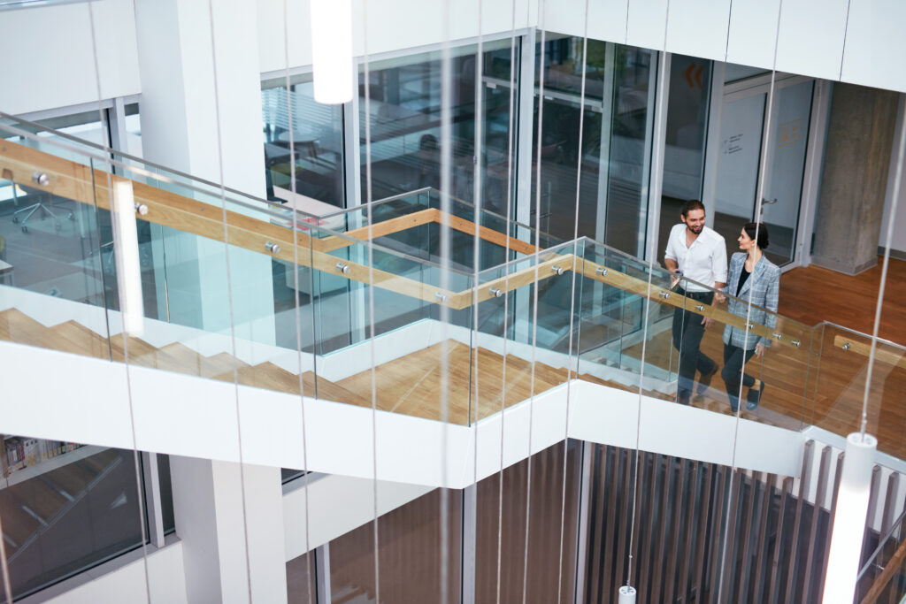 Business,People,Working,In,Modern,Office.,Man,And,Woman,Walking STS Secondary Image 25